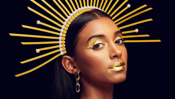 Indian Woman with gold eyeshadow, gold lipstick, and golden crown | Mindfulness for Self-Love